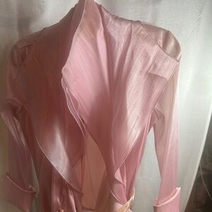 Pink blouse with pearl belt accent